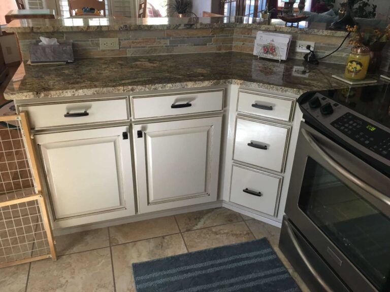 Painted white lower kitchen cabinets