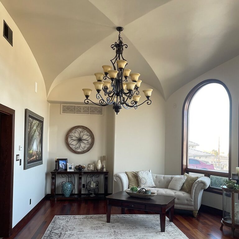 Painted living room with arched window